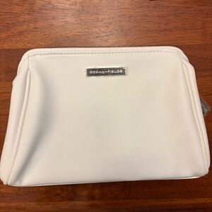 RODAN + FIELDS WHITE LEATHER MAKEUP BAG